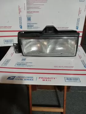 16507105 General Motors 1990 Cadillac Deville Lh/driver Side Headlight With Housing Oem