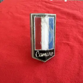 341055 General Motors 1974 Chevrolet Camaro Grille Ornament Emblem Some Damage To Plastic