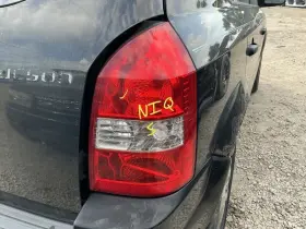 166-59814r Hyundai Passenger Tail Light Quarter Mounted Fits 05-09 Tucson 772835