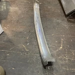 1958-62 Chevy Corvette Upper Grill Bar Molding Part 3739320 Used. Price: $250.00.