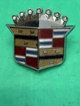 Original 1969-1970 Cadillac Hood Emblem 1600116 Used. Price: $28.50.