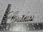 Oem Oldsmobile Cutlass Nameplate Badge Emblem Script Gm Part # 408954 Metal Used. Price: $12.00.