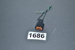04-07 Mitsubishi Lancer Headlight Connector Plug Pigtail Used. Price: $10.00.