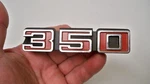 Oem Chevrolet 1971 1975 350 Emblem Ornament 1972 1973 1974 Gm 3991172 New. Price: $65.00.