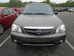Passenger Quarter Panel With Wheel Lip Moulding Fits 01-04 Mazda Tribute 1516783 Used. Price: $200.00.