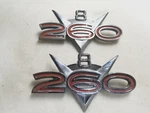 Pair Of 1962-64 Ford Fairlane Original 260 V8 Fender Emblem Oem C2OB-16C144-B Used. Price: $34.00.