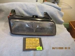 Chevrolet Corsica Beretta Gm Factory Passenger Headlight Mounting Bracket Bulbs Used. Price: $60.00.