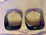 1974-76 Firebird Trans Headlamp Bezels Gm Pair 492667 Lh 492666 Rh Oem Used. Price: $40.00.