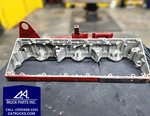 Cummins Ism Rocker Housing, Egr Valve, Intake Manifold, Front Lifting Bracket Used. Price: $450.00.