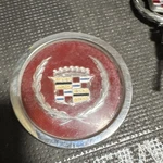 One 1981-1985 Cadillac Eldorado Seville 15" Wire Hubcap Center Gold Wreath Used. Price: $45.00.