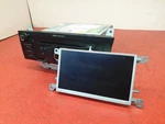 Audi Q5 Radio Stereo Head Unit Cd 2009 8T0919603G / 8T2035186P Used. Price: $195.11.