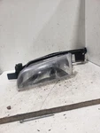 Used Left Headlight Assembly Fits: 2000 Pontiac Grand Prix Grade. Price: $50.00.