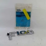 Nos Oem Ford 82 83 F100 E2TZ-16720-B Front Fender Emblem Name Plate New. Price: $75.00.