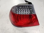 Left Quarter Tail Light (clear Turn Lens) - Bmw E46 3 Series Coupe Oem 6920699 Used. Price: $160.00.