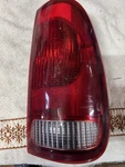 Ford Oem F85B-13B504-C Right/passenger Side Tail Light Used. Price: $23.52.