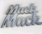 Mack Script Hood Emblems Pair Lot Of Part # 27RU2127A Used. Price: $75.00.
